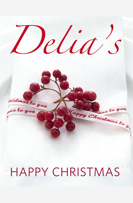 Book cover of Delia's Happy Christmas by Delia Smith at Wild and the Sage, Galle, Sri Lanka