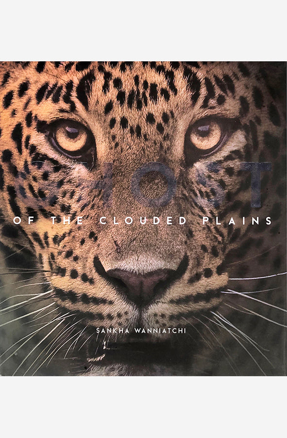 Book cover of Ghost of the Clouded Plains by Sankha Wanniatchi at Wild and the Sage, Galle, Sri Lanka