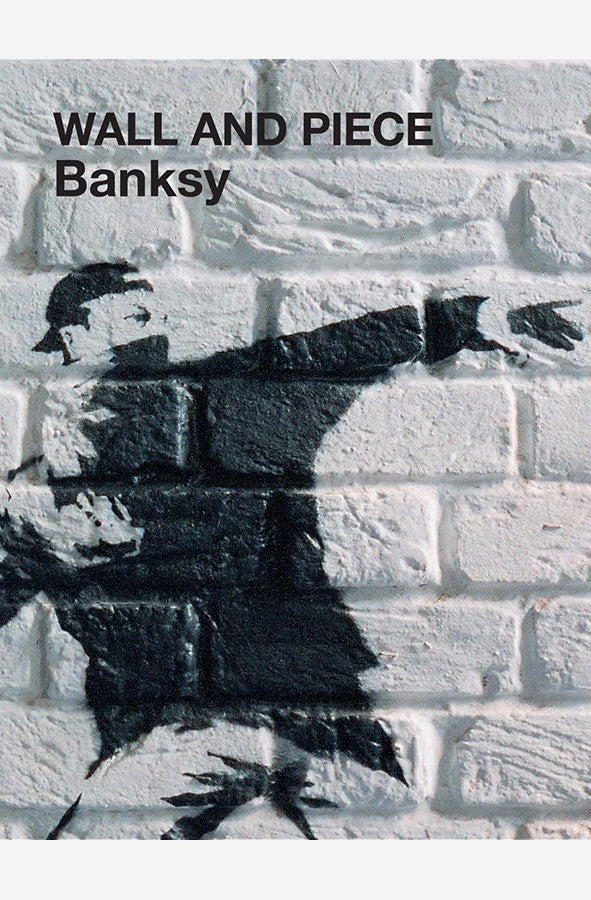 Book cover of Wall and Piece by Banksy at Wild and the Sage, Galle, Sri Lanka